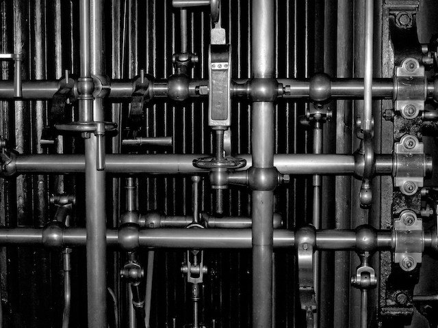 Metal pipes of various sizes in horizontal and vertical configuration