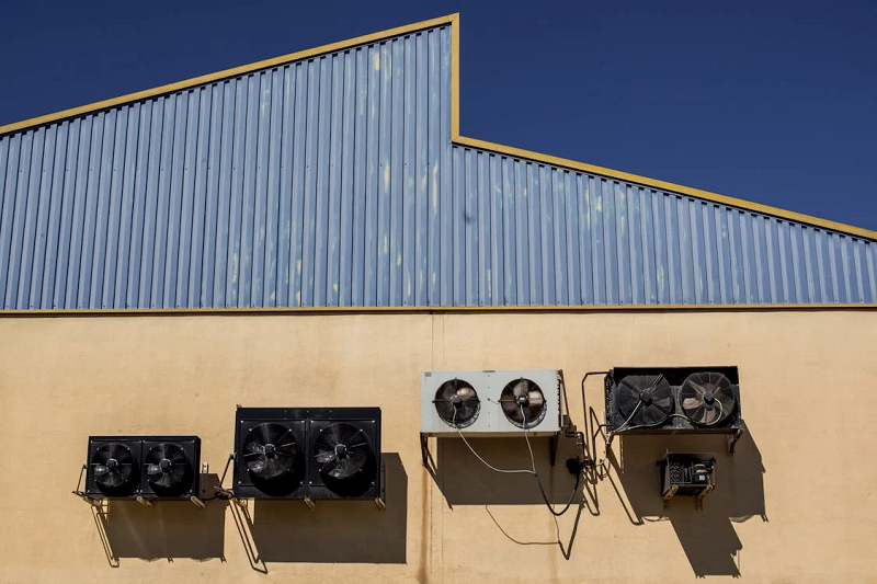 HVAC equipment on the exterior wall of a building